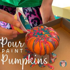 Pour paint pumpkins